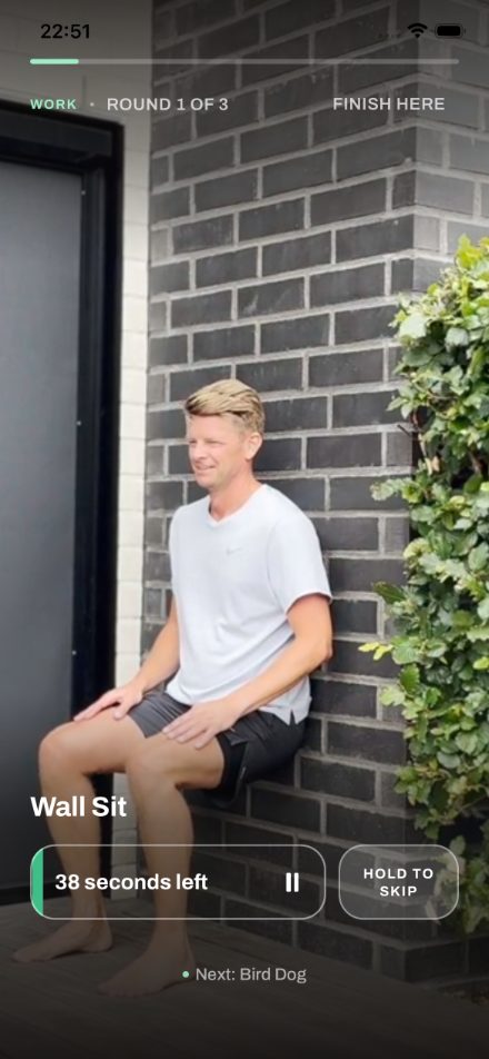 Wall Sit in progress with 38 seconds left and the next exercise shown